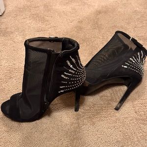 Black high heel open toe booties